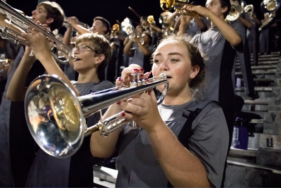 Trumpet player Sara Kelly performing in the stands. Photo by: Charlotte Gottfried