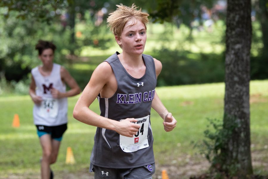 An athlete running at a competition early Saturday morning. Photo by: Charlotte Gottfried