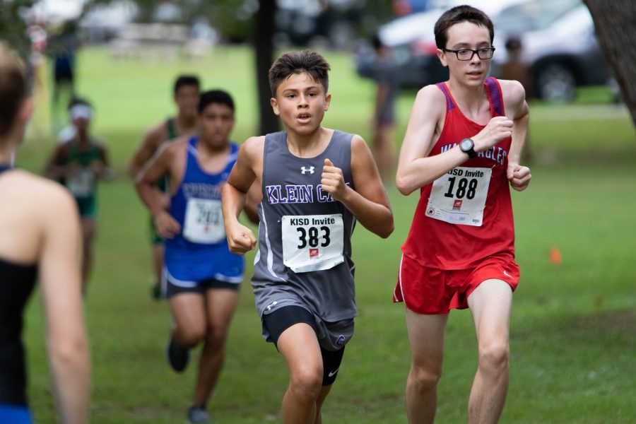 An athlete attempting to surpass a competitor as they race towards the finish line. Photo by: Charlotte Gottfried