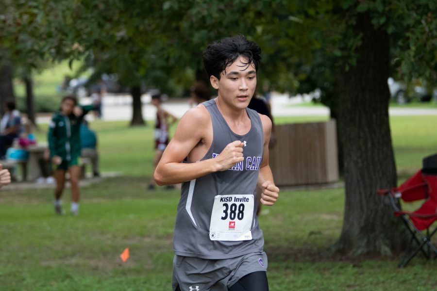 An athlete running at a competition early Saturday morning. Photo by: Charlotte Gottfried