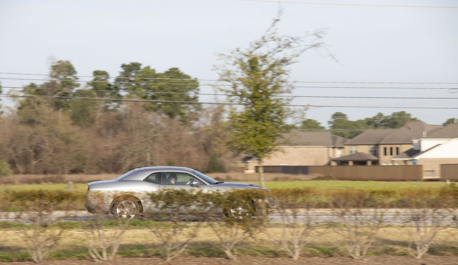 Drivers Ed: A GT Mustang driver passes by Klein Cain High School. Photo by: Douglas Pham