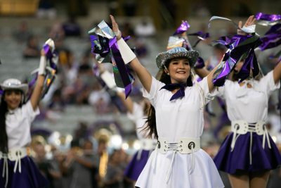 Legacies colonel Samantha Gasch-Walker dancing during the halftime show. Photo by: Zoe Rivers