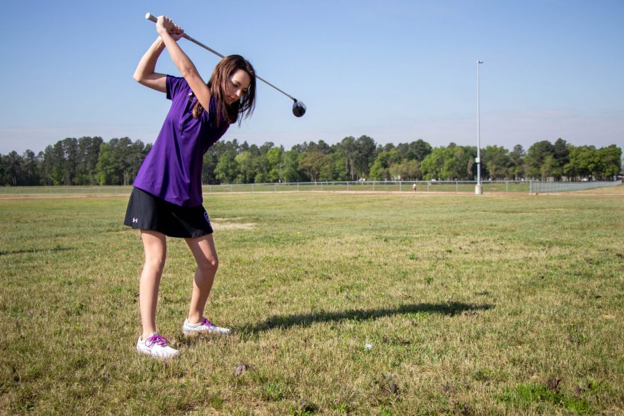 Jordan Mcalister swings her driver in anticipation of hitting her ball.  Photo by: Piotr Fraczek