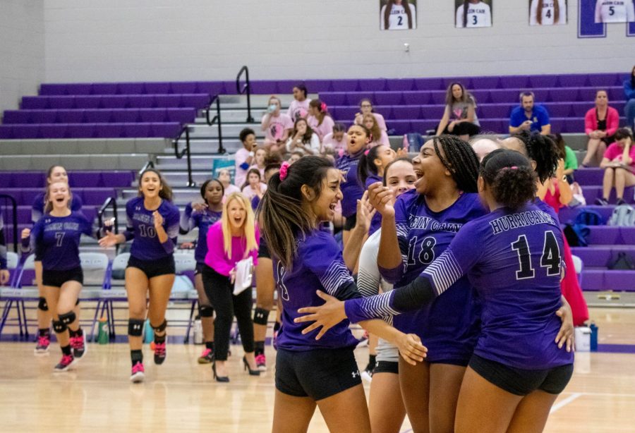 Klein Cain JV volleyball team celebrating a win. Photo by: Tyler Grosvenor.