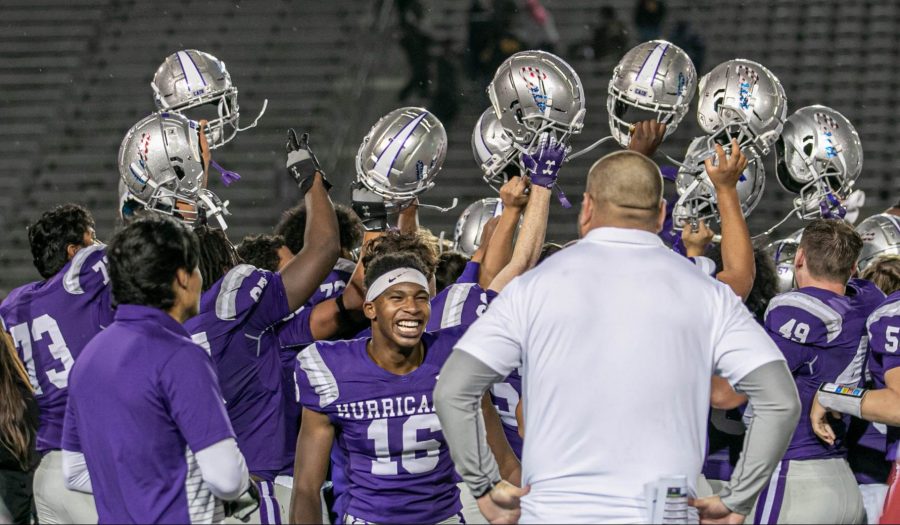 Klein Cain football team celebrating after winning the game against oak and qualifying for playoffs. Photo by: Zoe Rivers