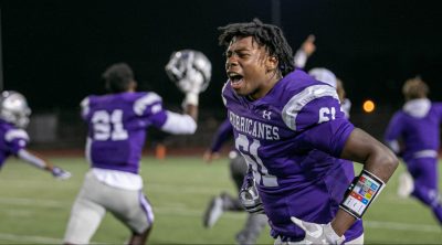 Isaiah Wiley celebrating after winning the game against Klein Oak and qualifying for playoffs. Photo by: Zoe Rivers