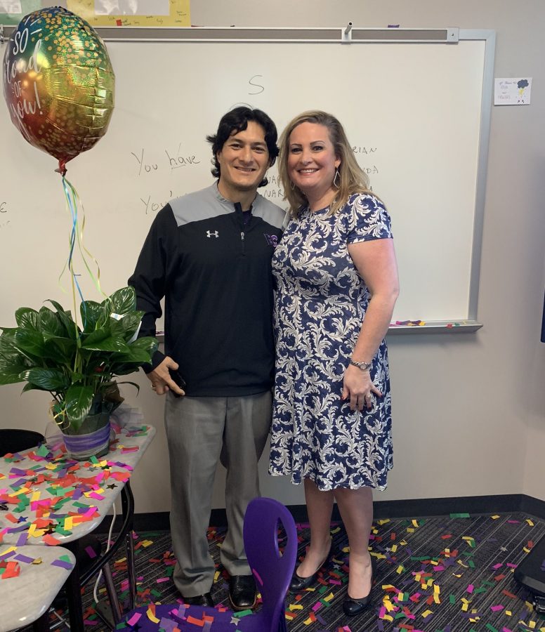 English teacher and football Andres Gomez accepting his teacher of the year award from Nicole Patin.