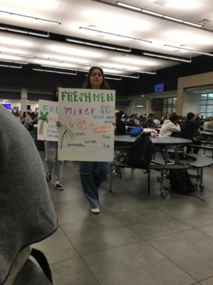 Two STUCO members advertising their freshman dance. Photo by Mary Kennedy