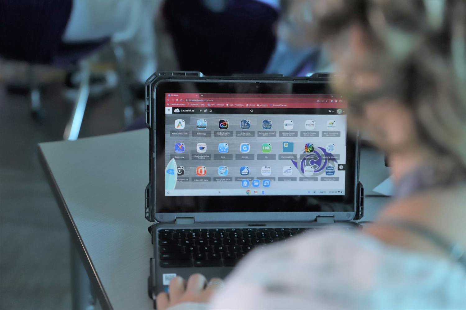 Student with Chromebook