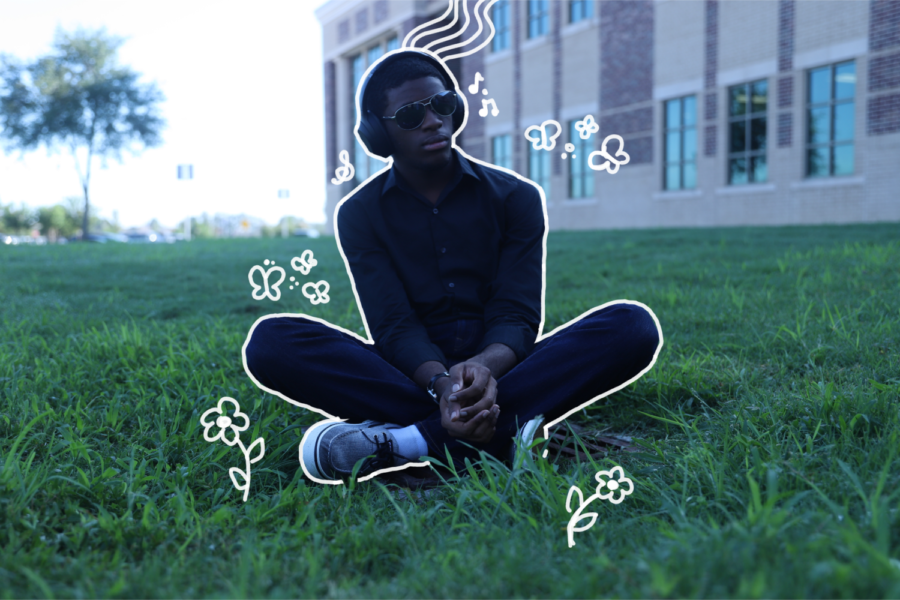 Jeremiah Patterson listening to Butterfly by Mariah Carrey on Klein Cain campus.
