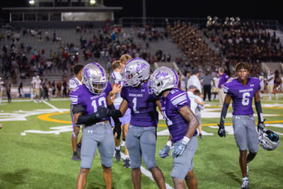 Klein Cain players discuss a game plan to beat Summer Creek