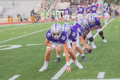 Klein Cain's offensive line warming up on the field